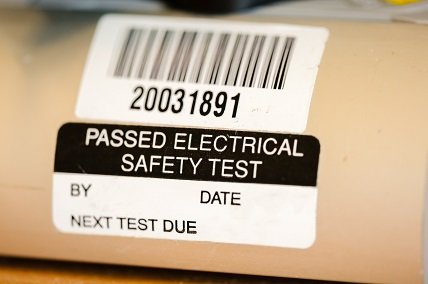 Sticker on an electrical appliance stating that it has passed a safety test in Sheffield commercial property